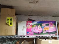 Shelf lot with barbie magical motor home plastic b