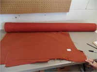 Bolt of Reddish Upholstery Fabric