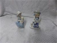 small girl and boy figurines