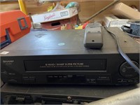 2 VCR players one sharp one Panasonic