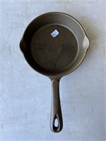 small cast-iron frypan approximate 4 inch