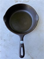#five unmarked 8 inch Wagner cast-iron fry pan