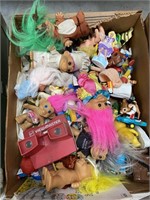plastic troll dolls and miscellaneous kid toys