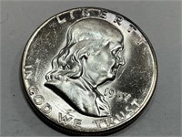 1957 CH BU Franklin Half Dollar