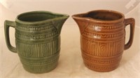 Pair of Art Pottery Pitchers