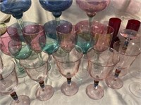 Large lot of multicolored stemware unnamed