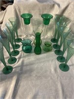 Lots of green glass, candleholders vases and