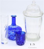 Vintage blue glass decanter 7" tall by 5" wide,