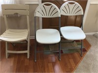 Three folding chairs