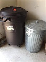 Two trash cans one Rubbermaid 32 gallon, one