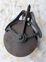 Metal frame wood pulley