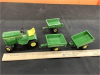 John Deere garden tractor and 3 wagons