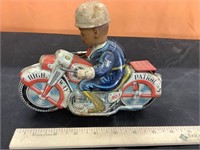 Tin police motorcycle toy