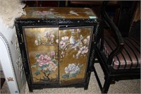 Oriental Décor Cabinet; Raised Design; Brass knobs