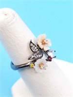 Sterling silver ring with CZ, garnet and carved mo