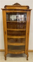 EXCEPTIONAL 1910 SERPENTINE GLASS FRONT CABINET