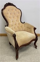 PRETTY ANTIQUE UPHOLSTERED ARMCHAIR W CARVED BACK