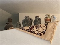 Pottery above closet in living room - 5 pieces