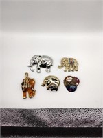 5 elephant brooches and pendants