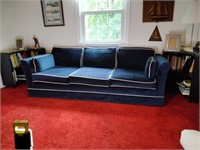 Vintage blue couch with white piping.  1