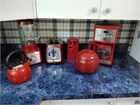Red kitchen appliances. Coffeemaker. Teapot