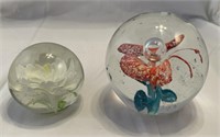 Two glass paperweights
