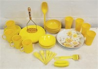 Mid-century yellow plastic dinnerware