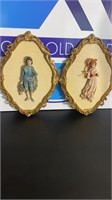 Set of wall hanging ceramic boy and girl