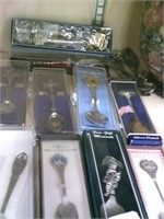 16 collector Spoons