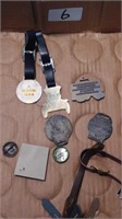 Assorted watch fobs and pins