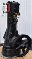 Vertical steam engine with repairs,