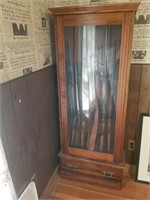 Walnut gun cabinet