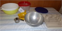 cutting board Tupperware mixing bowls cake holder