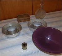 bottle, wood box, purple dish, 2 cake pans