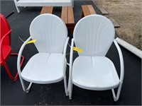 2-white metal lawn chairs