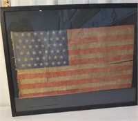 Very old American flag in frame