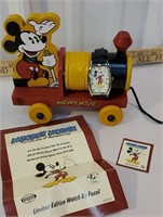 Mickey Mouse watch made by fossil with paperwork