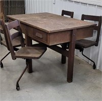 Industrial table with attached swivel out seats