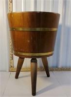 Wooden footed bucket planter