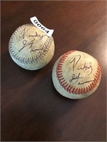 2 baseballs. Signed “ pinky”