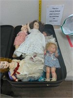Suitcase full of old dolls