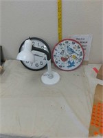 Clock,  thermometer, reading lamp