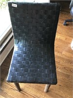 Leather strapped chair