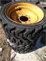 4 - Skid Steer Tires on Rims, 265-521