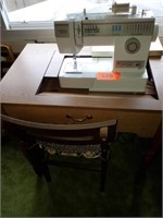 SINGER MODEL 9410 SEWING MACHINE  IN CABINET