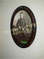 Old portrait in oval frame