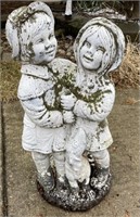 Two kids and dog statue