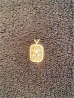 14 kt gold diamond pendant