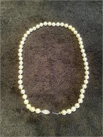 Faux pearls with 14 kt gold clasp