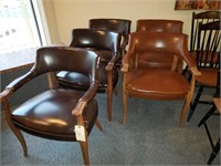 five vinyl armchairs